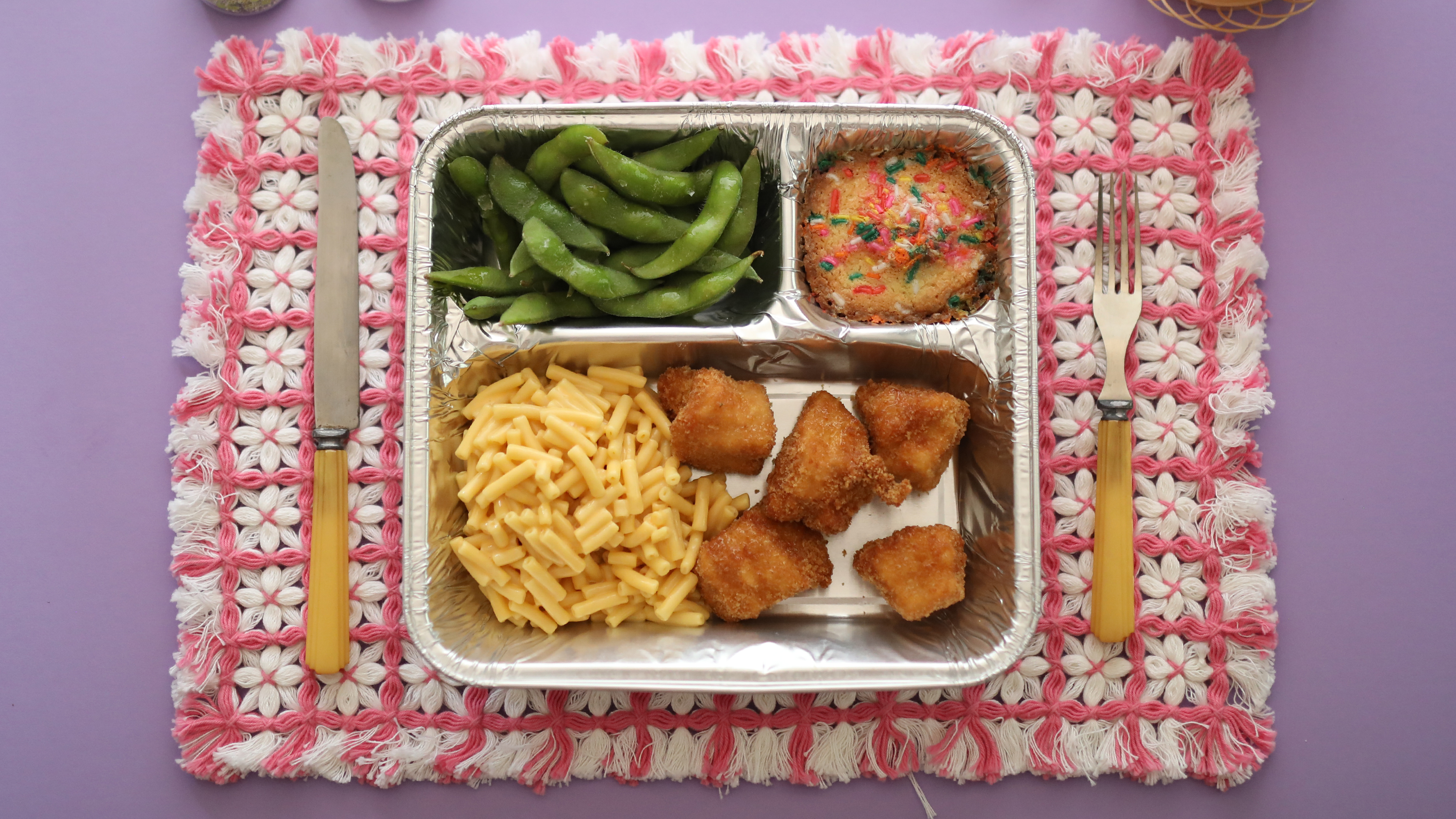 tv dinner chicken nuggets on a place setting