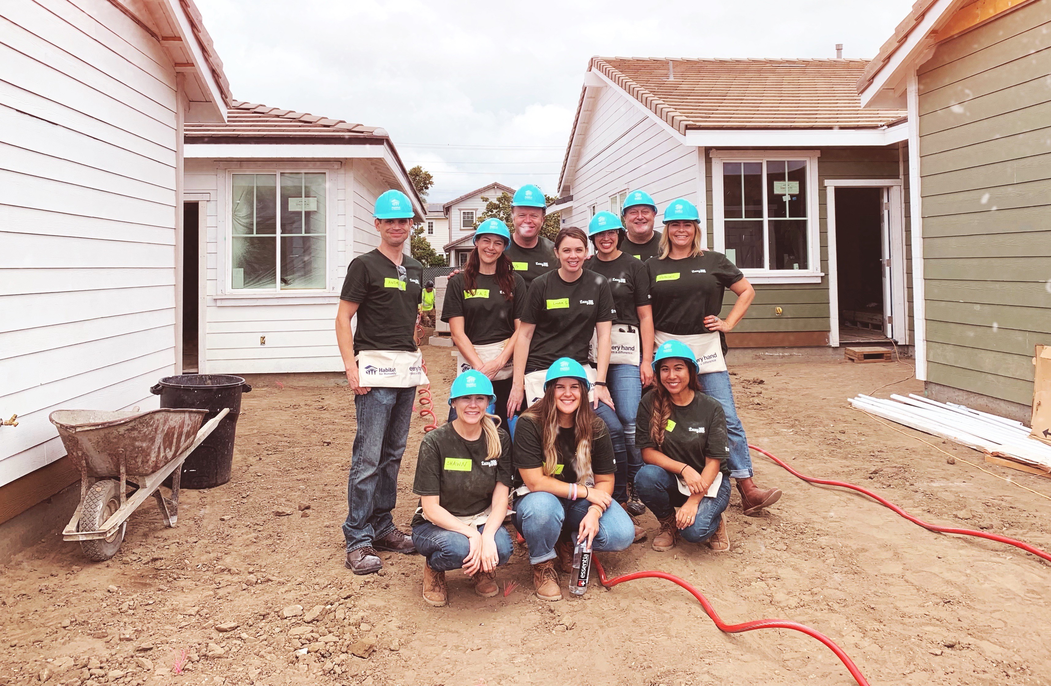 Team Lazy Dog volunteering at a Habitat for Humanity Build